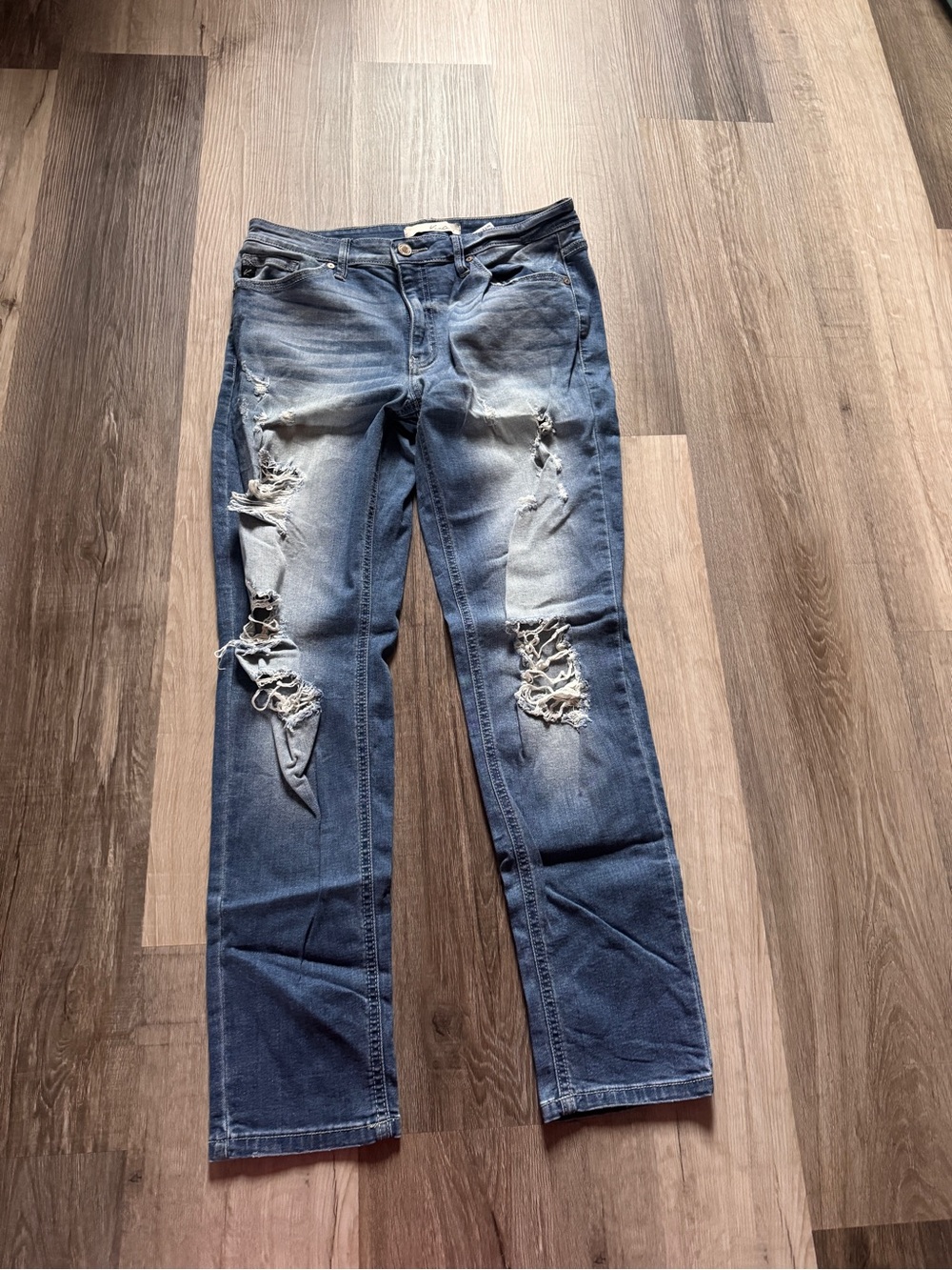 Woman’s Distressed Blue Denim Jeans - Classic Ripped Style